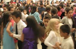 Kindergarten to upper grade students enjoy the "barn dance."